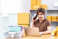 Startup small business entrepreneur SME, asian man receive order on phone. Portrait young Asian small business owner home office, Royalty Free Stock Photo