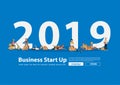 Startup small business owner young using mobile gadgets with flat big letters 2019 new year