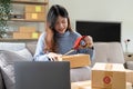 Startup small business, Young woman working freelance and packing box delivery products to customers, Ordered online Royalty Free Stock Photo