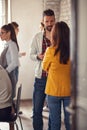 Startup team relaxing from work during coffee break Royalty Free Stock Photo