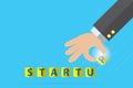 Startup word and businessman hand, business concept