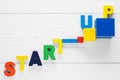 Startup word made from colored wooden letters