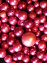 Pile of magenta pearl beads Royalty Free Stock Photo