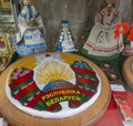 State emblem of Belarus, showcase with Belarusian souvenirs