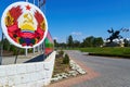 State emblem and the monument to Commander Suvorov - downtown of the city Tiraspol, Transnistria, Moldova