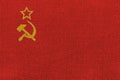 State flag of the Union of Soviet Socialist Republics on the background fabric, waving in the wind. The concept of design