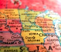 State of Iowa USA focus macro shot on globe map for travel blogs, social media, web banners and backgrounds.