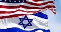 State of Israel national flag waving in the wind with the American flag Royalty Free Stock Photo