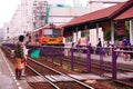 State Railways of Thailand SRT orange diesel electric train locomotive parked at Donmuang railway station