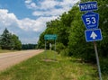 The State Route 53 North sign in front of the Chautauqua County sign in Carroll, New York, USA