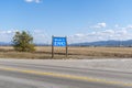 A state Welcome to Idaho roadside sign in the Coeur d`Alene region of Northern Idaho, United States of America