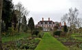 A stately home surrounded by a large garden