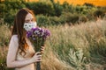 Statement Masks, Blinged out diy flower face mask design. Girl in face mask decorated with flowers on nature background