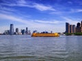 Staten island ferry with Lower Manhattan background Royalty Free Stock Photo