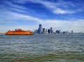 Staten island ferry with Lower Manhattan background Royalty Free Stock Photo