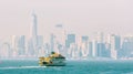 Staten Island Ferry and Lower Manhattan Skyline, New York, USA. Royalty Free Stock Photo