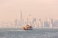 Staten Island Ferry and Lower Manhattan Skyline, New York, USA. Royalty Free Stock Photo