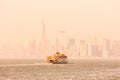 Staten Island Ferry and Lower Manhattan Skyline, New York, USA. Royalty Free Stock Photo