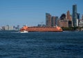 Staten Island Ferry with passengers NYC skyline and motor boat Royalty Free Stock Photo