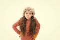 Static and frizz. Adorable child long hair soft fur hat. Child care concept. Girl long hair wear fur hat white