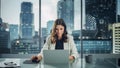 Static Portrait of Successful Caucasian Businesswoman Sitting at Her Desk Working on Laptop Computer Royalty Free Stock Photo