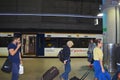 Station London Stansted with arriving passengers and the Stansted Express in background