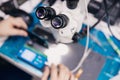 Station with microscope for repair and soldering of microcircuits mobile phones and electronic devices Royalty Free Stock Photo