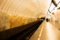 Station of the Moscow metro Tsvetnoy Boulevard. Arrival of a train, train lights in a dark subway tunnel Royalty Free Stock Photo