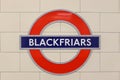 Station sign of the London underground tube in a close up view. Royalty Free Stock Photo