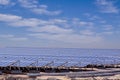 Station of solar panels in the desert against blue sky Royalty Free Stock Photo