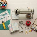 Station with a vintage Singer sewing machine surrounded by sewing Royalty Free Stock Photo