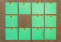 Stationary, Blank Green Sticker Pined on Brown Board. Flat Lay. Time-management, Planning. Royalty Free Stock Photo