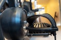 Stationary exercise bike pedals in home gymnasium to keep fit and healthy