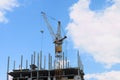 Stationary hoist on construction site, part of building Royalty Free Stock Photo