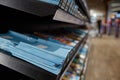 Stationary shop rack with paper copy-books assortment selective focus Royalty Free Stock Photo