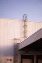 Fixed Steel Ladder for Vertical Climbing a Warehouse Wall