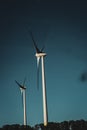 A stationary wind turbine in a field