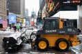 Snowplow in Times Square during a Winter Snowstorm in New York City