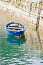 Stationed blue boat in Rias Baixas, Galicia, Spain