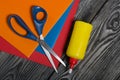 Stationery. Colored paper, scissors and glue. On brushed pine boards Royalty Free Stock Photo