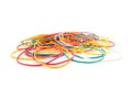 Stationery colored rubber bands isolated on white. Lots of rubber bands