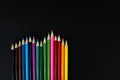 Stationery colorful pencils on black background. Back to school. Office supplies products. Top view. Flat lay Royalty Free Stock Photo