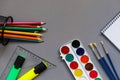 Stationery for students, students on a grey background. Ready for school Royalty Free Stock Photo