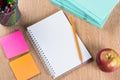 Stationery stuff on wooden table from top view as back to school idea Royalty Free Stock Photo