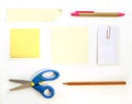 Stationery supplies scissors note paper pen pencil paper clips and tape on white background