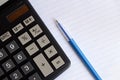 Stationery on the table. Calculator, pen, notebook Royalty Free Stock Photo