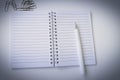 Stationery white handle and notebook, scraper work in the office, training, business planning Royalty Free Stock Photo