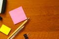 Office supplies and flash drives on a wooden table