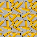 Stationery, wooden yellow pencils on a gray background.