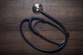 Statoscope over brown wooden table Royalty Free Stock Photo